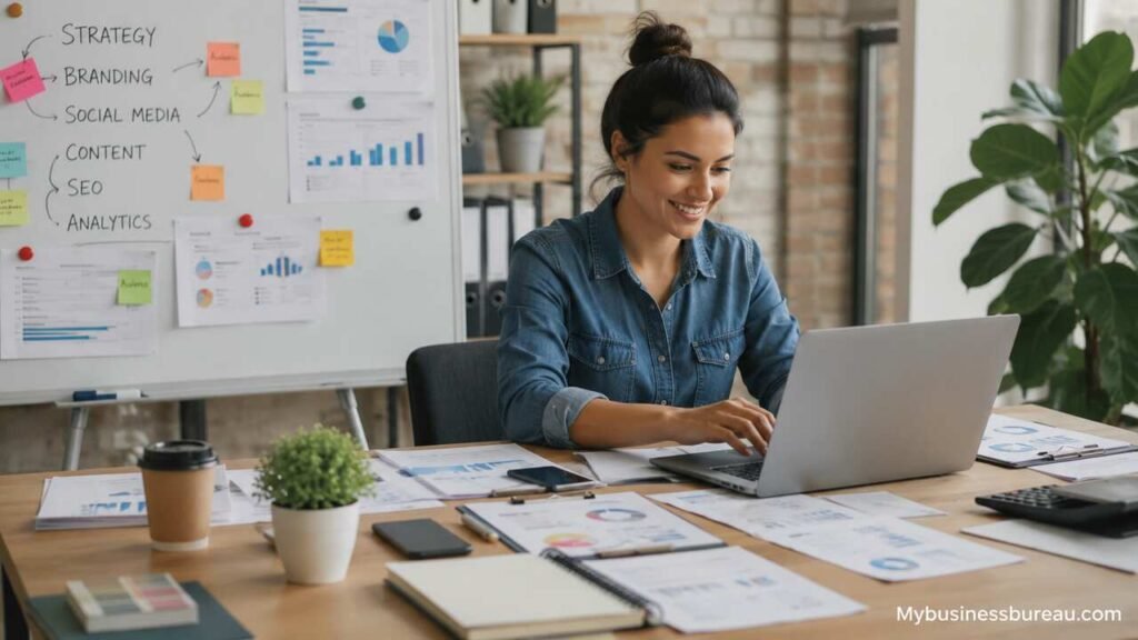 Small business owner working on digital marketing strategies in a modern office