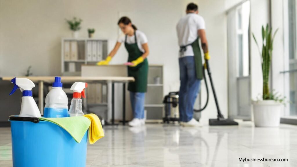 Professional cleaners working in a modern office cleaning business