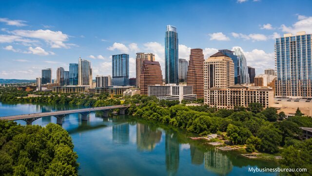 Austin commercial real estate market skyline overlooking Lady Bird Lake.